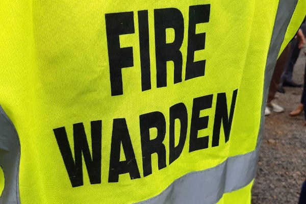 Trained fire warden in vest