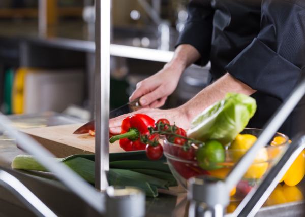 Chef preparing recipe in kitchen