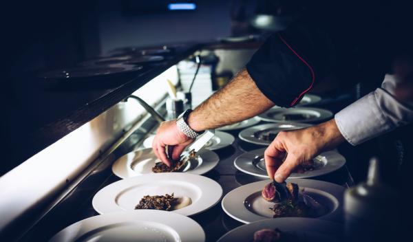 Chefs preparing dishes