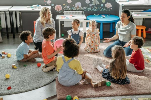 Childminders with children in creche