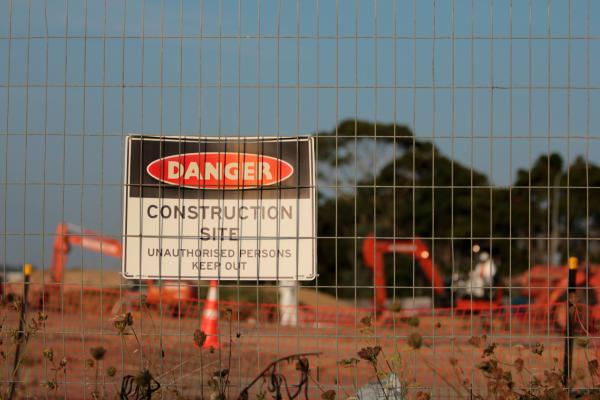 Danger sign at building site