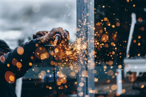 Angle grinding on building site