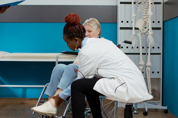 assisting patient with mobility issues